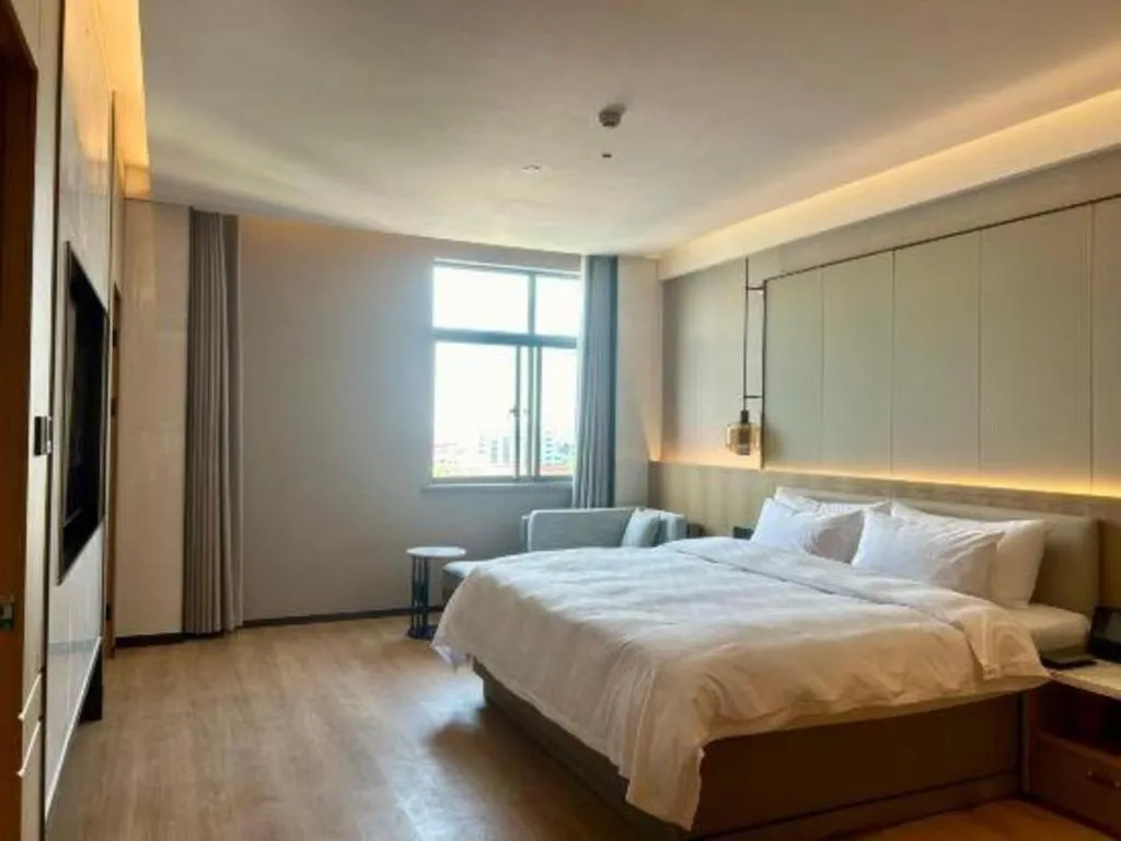 Bed in Zhangjiagang Jiangnan Garden Hotel