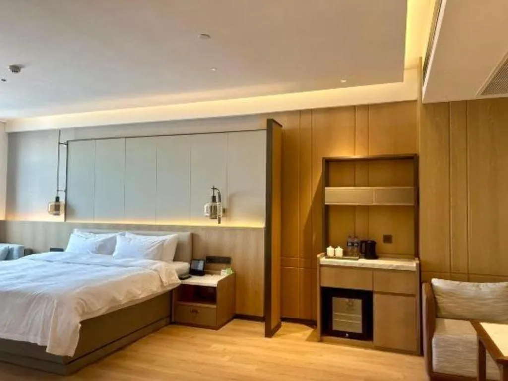 Bed in Zhangjiagang Jiangnan Garden Hotel