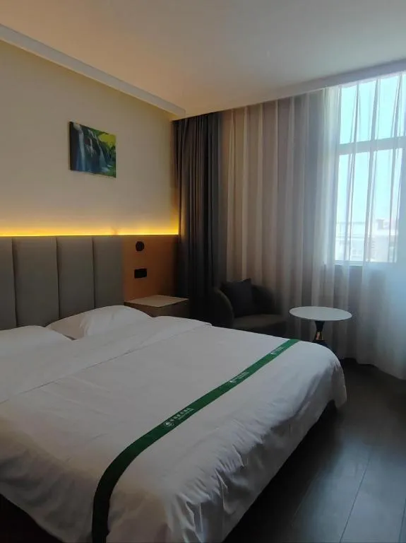 Bed in GreenTree Inn Suzhou Wujiang Zhenze Town Zhennan Road Express Hotel