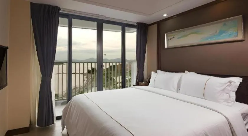 Bed in Island Skylight Resort