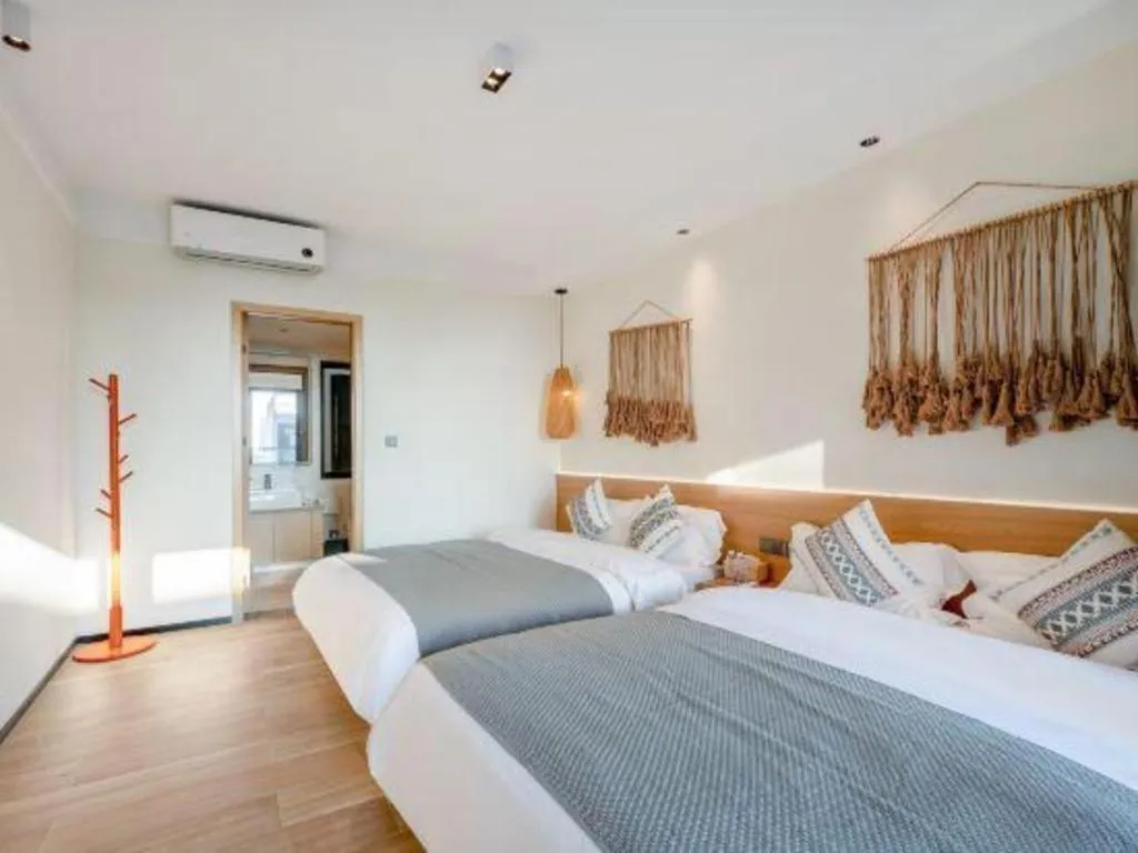 Bed in Island Skylight Resort