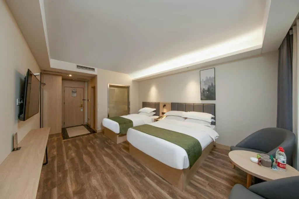 Bed in GreenTree Inn Jiangsu Changzhou Henglin Town Shuntong Road Express Hotel