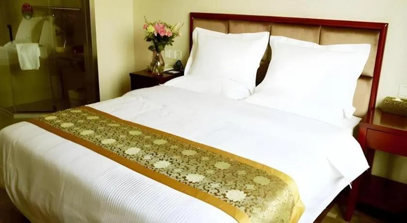 Bed in GreenTree Inn Jiangsu Changzhou Henglin Town Shuntong Road Express Hotel