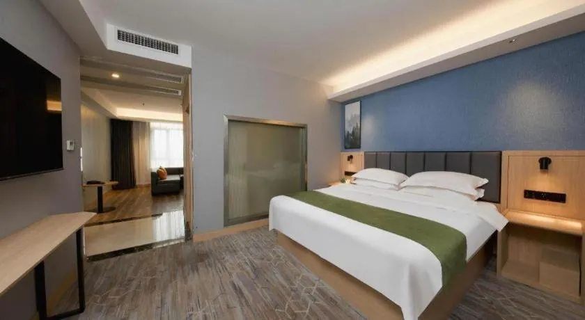 Bed in GreenTree Inn Jiangsu Changzhou Henglin Town Shuntong Road Express Hotel
