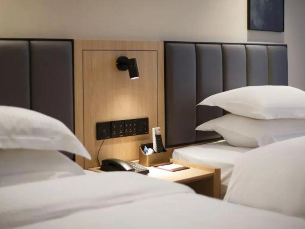 Bed in GreenTree Inn Jiangsu Changzhou Henglin Town Shuntong Road Express Hotel