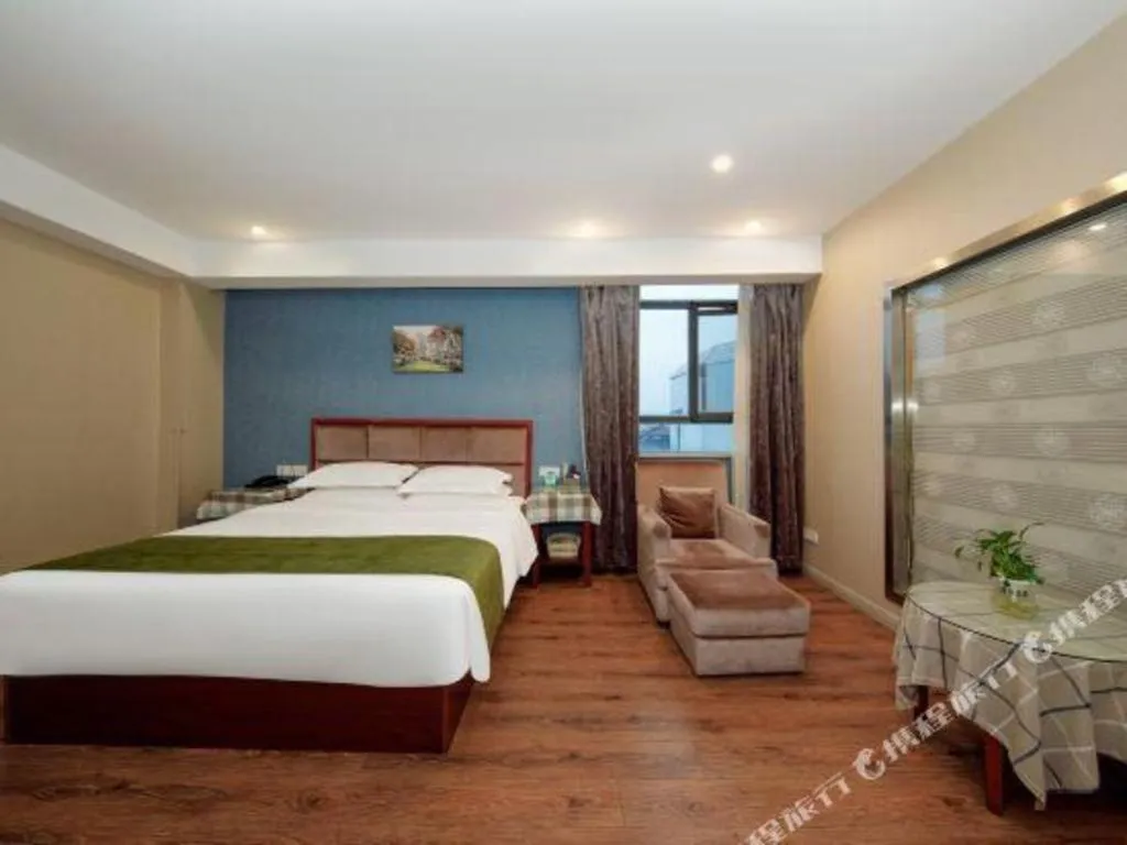 Bed in GreenTree Inn Jiangsu Changzhou Henglin Town Shuntong Road Express Hotel