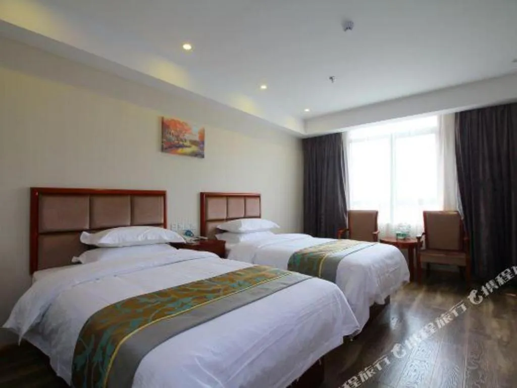 Bed in GreenTree Inn Jiangsu Changzhou Henglin Town Shuntong Road Express Hotel