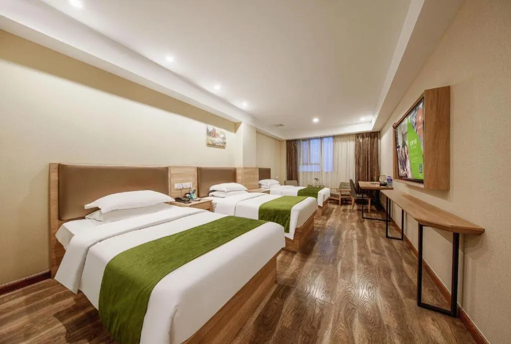 Bed in GreenTree Inn Jiangsu Changzhou Henglin Town Shuntong Road Express Hotel