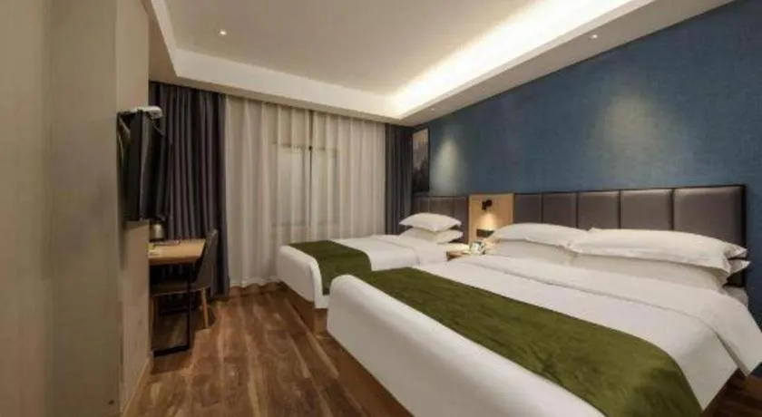 Bed in GreenTree Inn Jiangsu Changzhou Henglin Town Shuntong Road Express Hotel