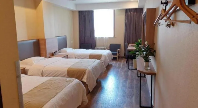 Bed in GreenTree Inn Jiangsu Changzhou Henglin Town Shuntong Road Express Hotel