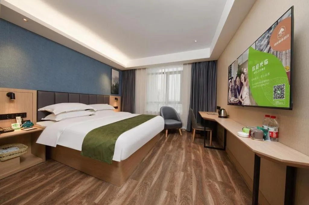 Bed in GreenTree Inn Jiangsu Changzhou Henglin Town Shuntong Road Express Hotel