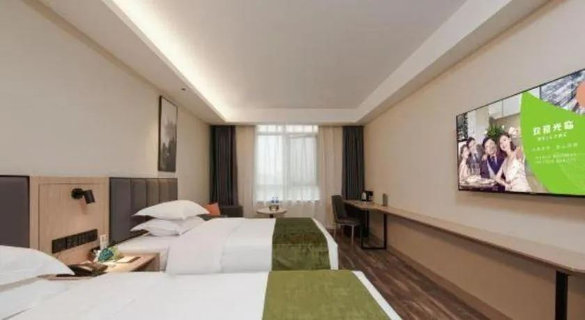 Bed in GreenTree Inn Jiangsu Changzhou Henglin Town Shuntong Road Express Hotel