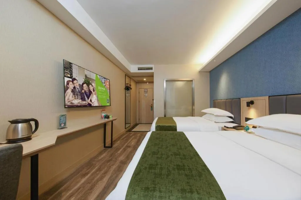 Bed in GreenTree Inn Jiangsu Changzhou Henglin Town Shuntong Road Express Hotel