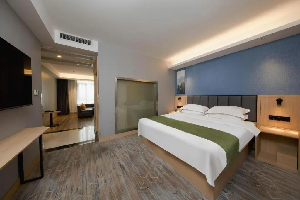 Bed in GreenTree Inn Jiangsu Changzhou Henglin Town Shuntong Road Express Hotel