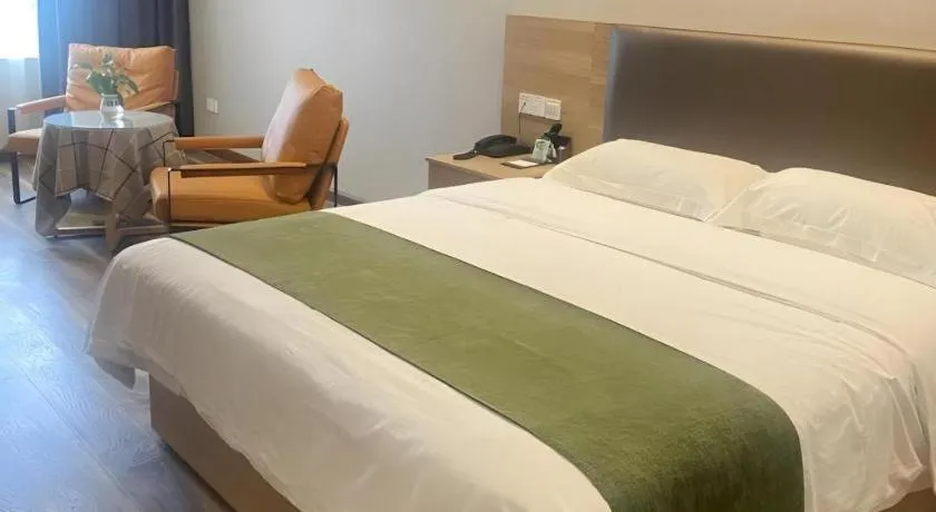 Bed in GreenTree Inn Jiangsu Changzhou Henglin Town Shuntong Road Express Hotel