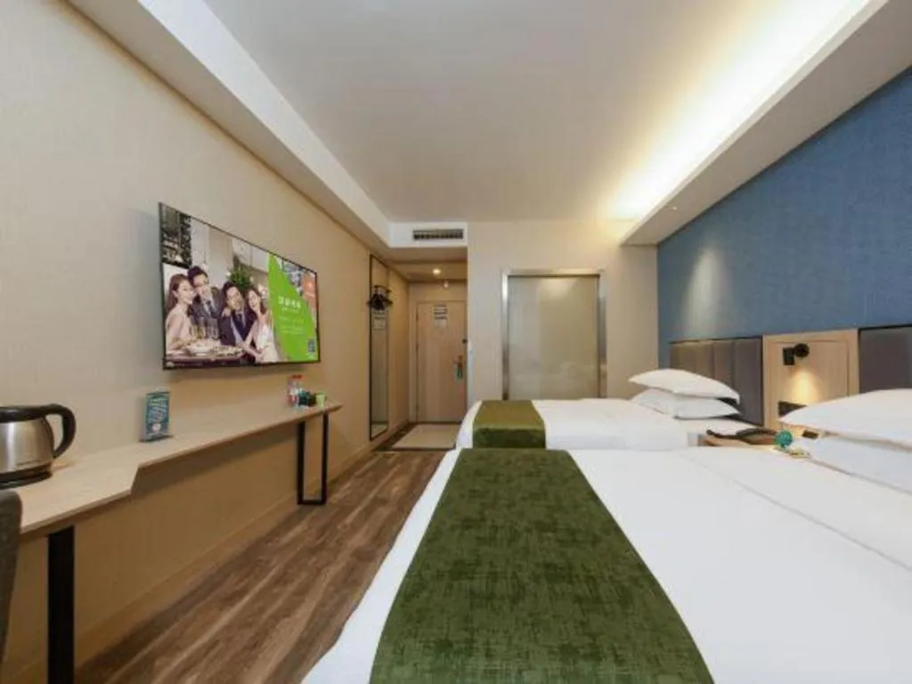 Bed in GreenTree Inn Jiangsu Changzhou Henglin Town Shuntong Road Express Hotel