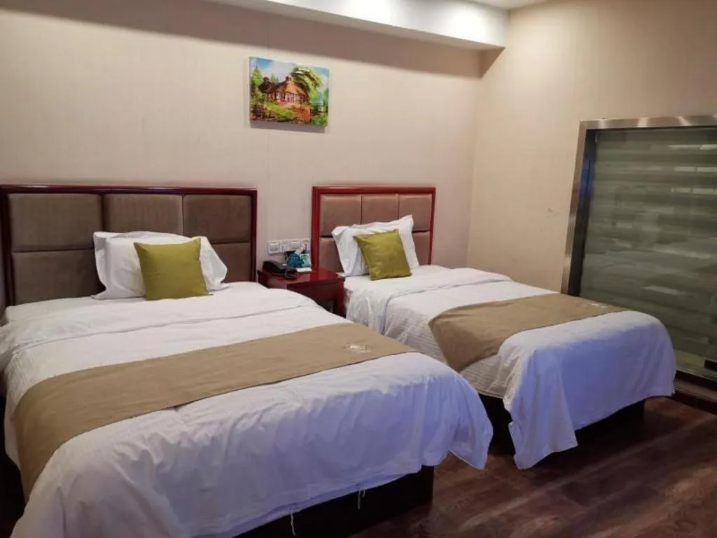 Bed in GreenTree Inn Jiangsu Changzhou Henglin Town Shuntong Road Express Hotel