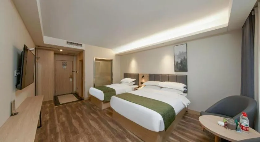 Bed in GreenTree Inn Jiangsu Changzhou Henglin Town Shuntong Road Express Hotel