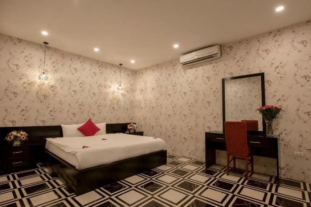 Bed in Helios Legend Hotel