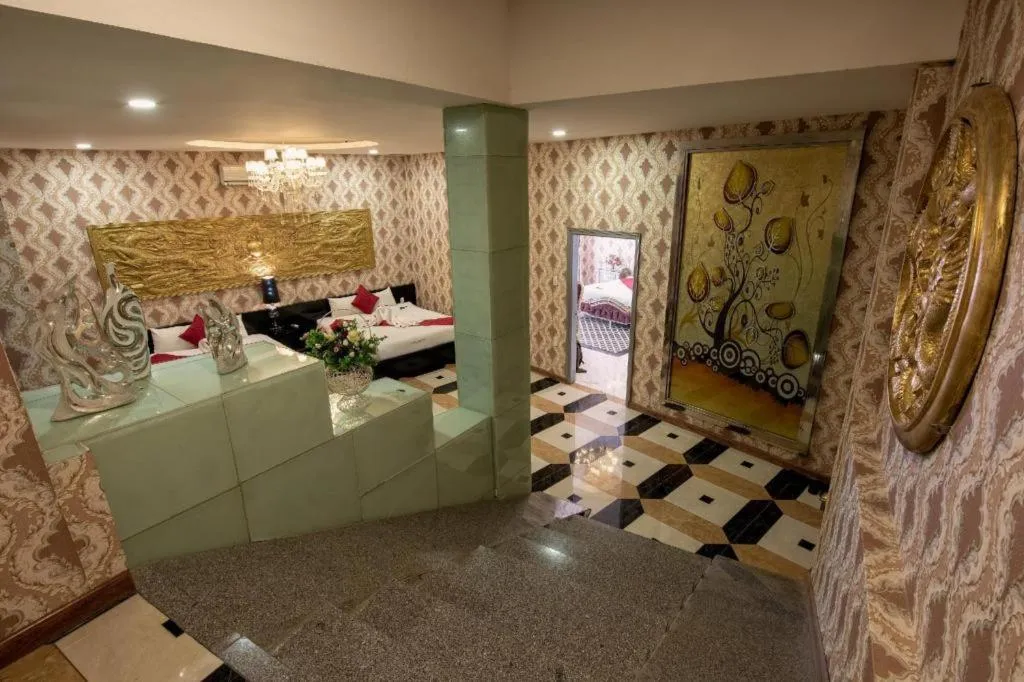 Bed in Helios Legend Hotel