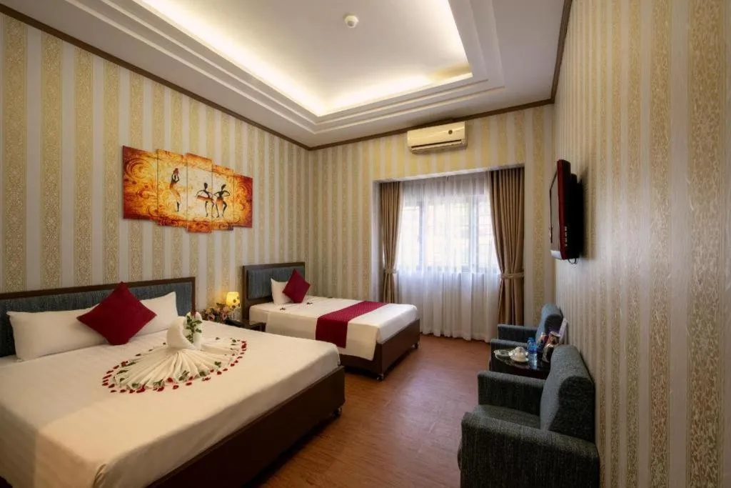 Bed in Helios Legend Hotel