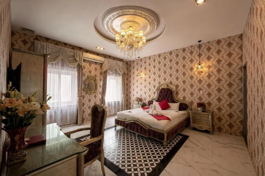 Bed in Helios Legend Hotel