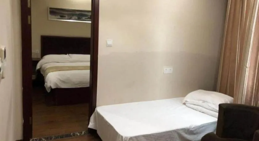 Bed in GreenTree Inn Jiangsu Wuxi New District High Speed Rail Station Newland Family Express Hotel