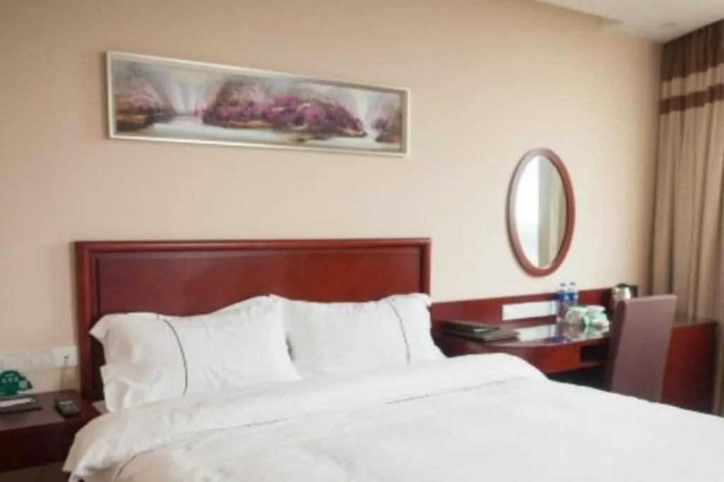 Bed in GreenTree Inn Jiangsu Wuxi New District High Speed Rail Station Newland Family Express Hotel