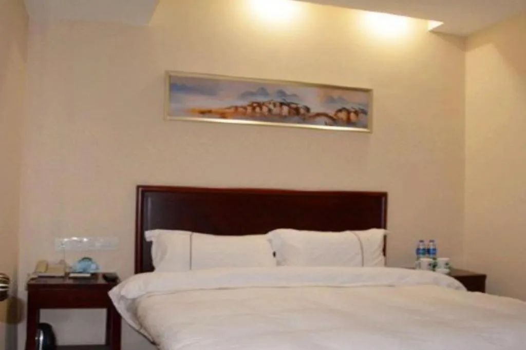 Bed in GreenTree Inn Jiangsu Wuxi New District High Speed Rail Station Newland Family Express Hotel