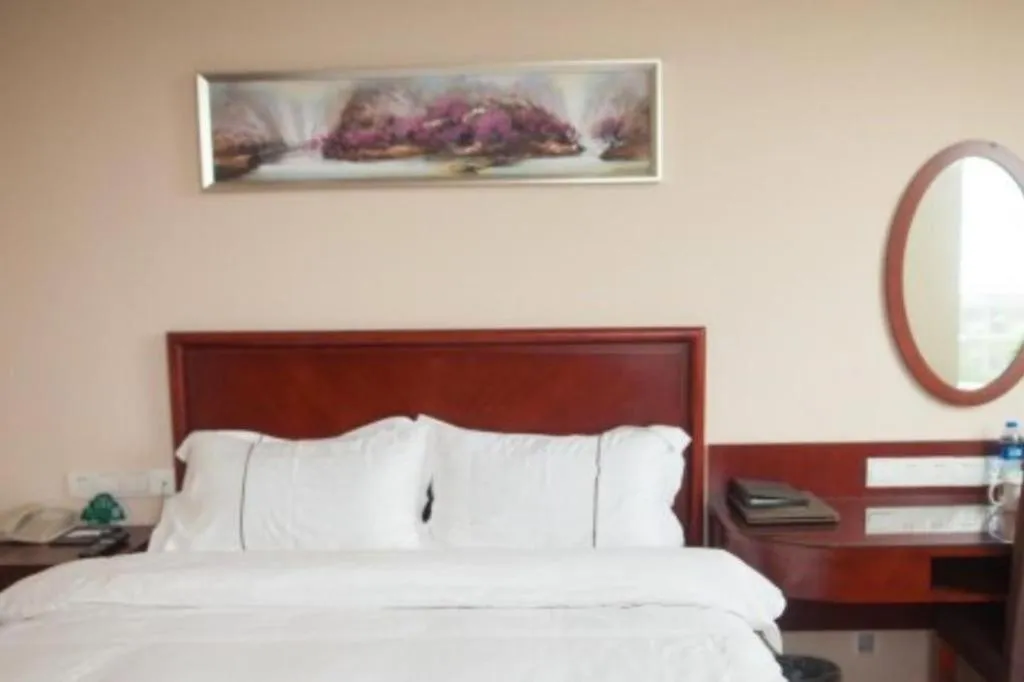 Bed in GreenTree Inn Jiangsu Wuxi New District High Speed Rail Station Newland Family Express Hotel