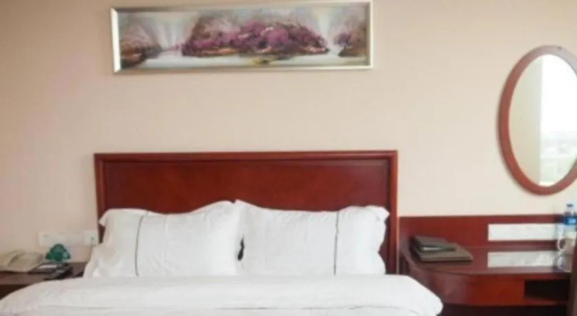 Bed in GreenTree Inn Jiangsu Wuxi New District High Speed Rail Station Newland Family Express Hotel