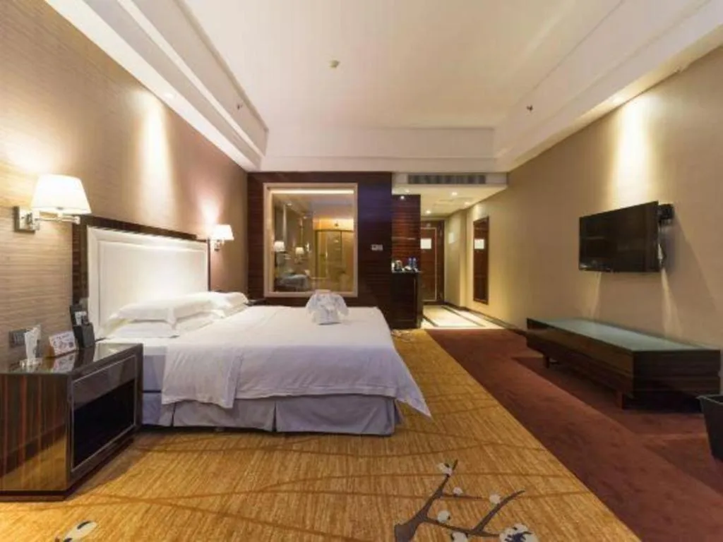 Bed in Country Garden Phoenix Hotel Yangshan