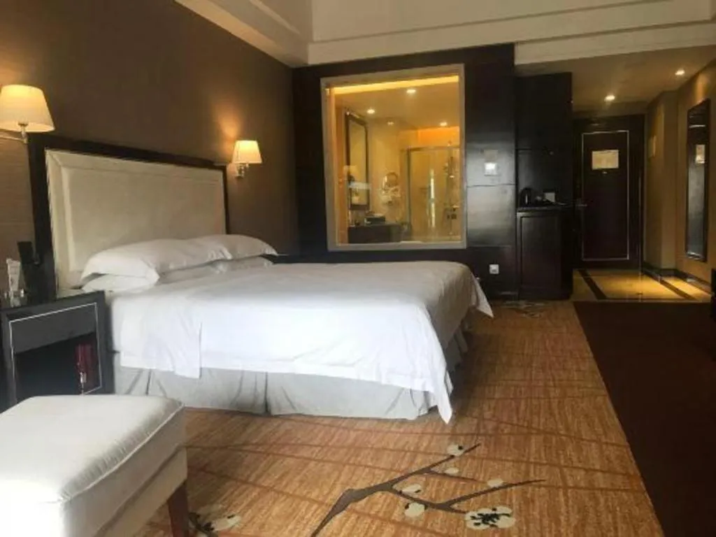 Bed in Country Garden Phoenix Hotel Yangshan