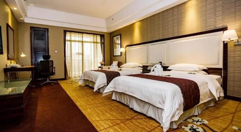 Bed in Country Garden Phoenix Hotel Yangshan