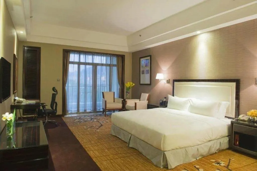 Bed in Country Garden Phoenix Hotel Yangshan