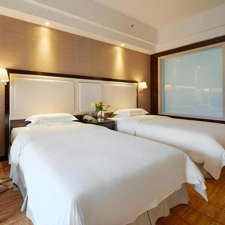 Bed in Country Garden Phoenix Hotel Yangshan