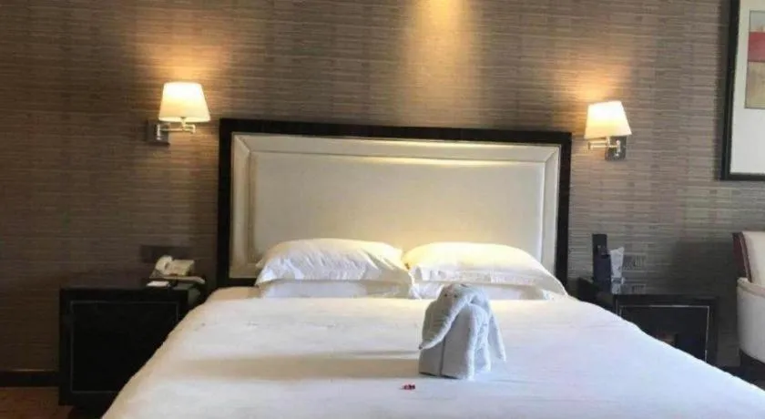 Bed in Country Garden Phoenix Hotel Yangshan