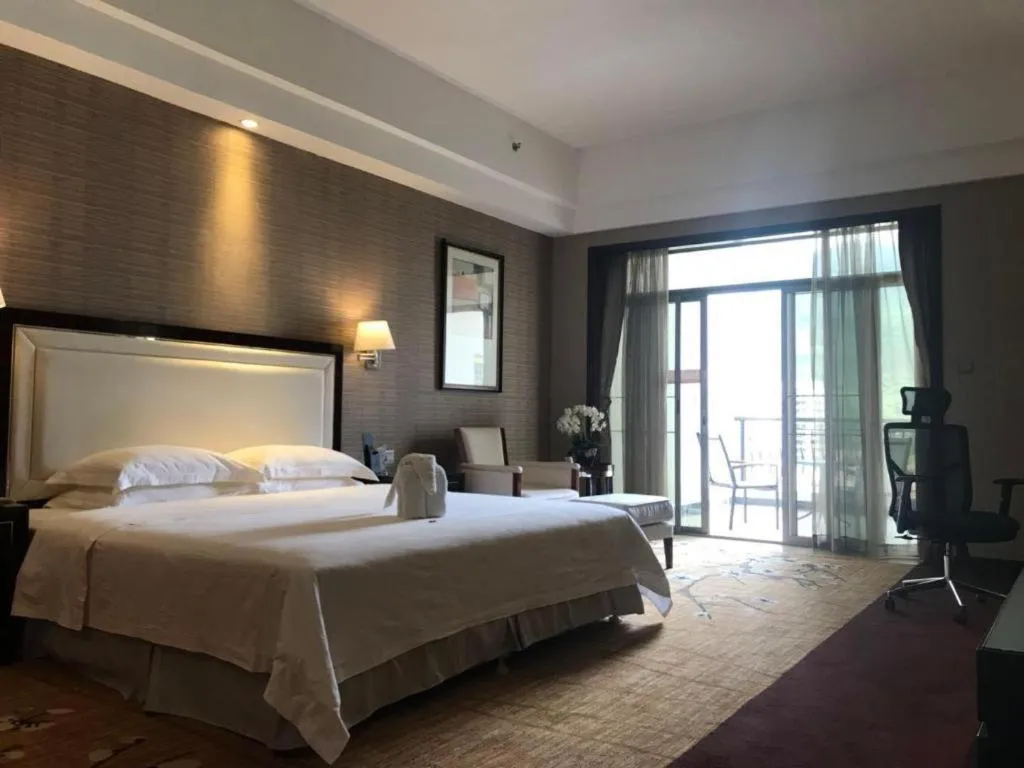 Bed in Country Garden Phoenix Hotel Yangshan