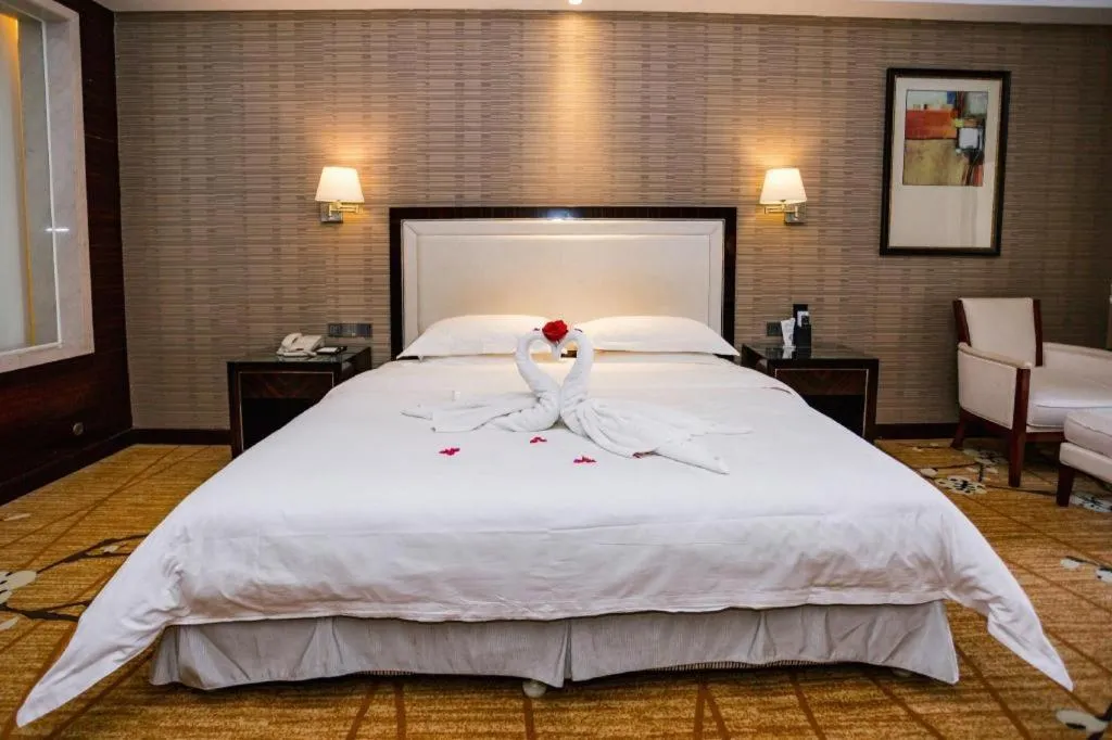 Bed in Country Garden Phoenix Hotel Yangshan