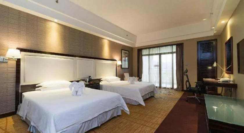 Bed in Country Garden Phoenix Hotel Yangshan