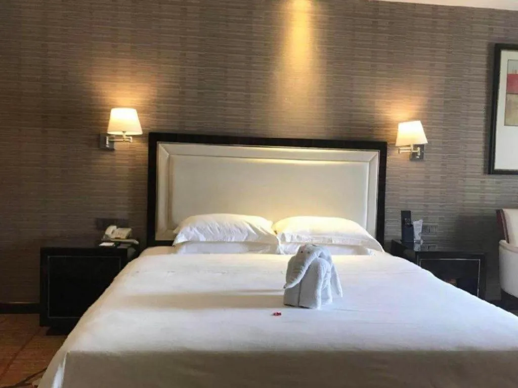 Bed in Country Garden Phoenix Hotel Yangshan