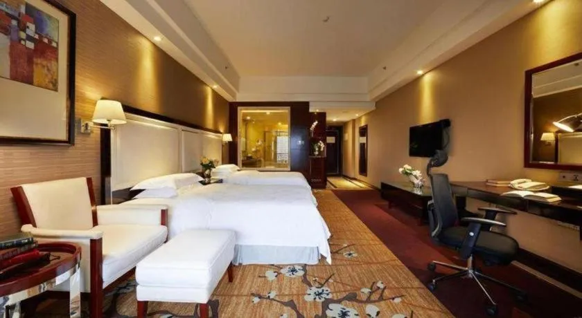 Bed in Country Garden Phoenix Hotel Yangshan