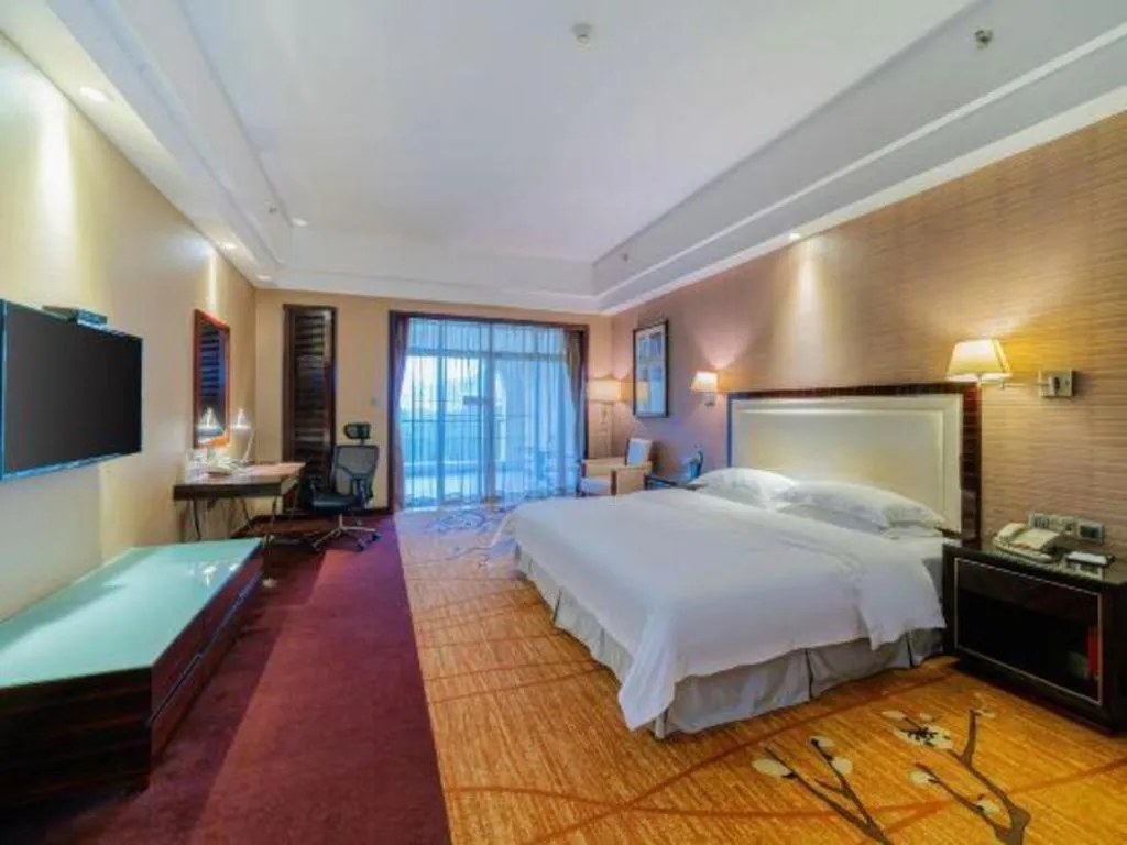 Bed in Country Garden Phoenix Hotel Yangshan