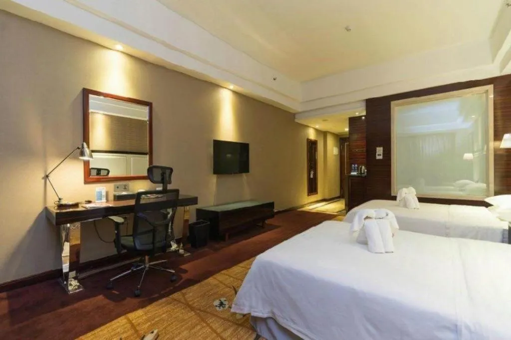 Bed in Country Garden Phoenix Hotel Yangshan
