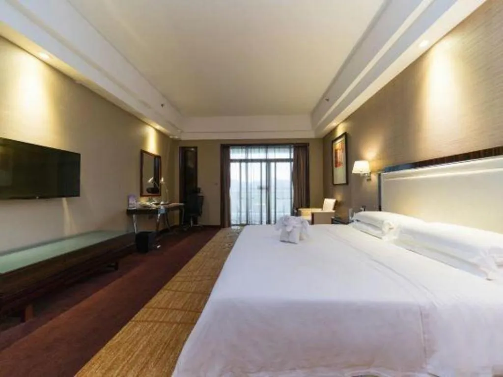 Bed in Country Garden Phoenix Hotel Yangshan