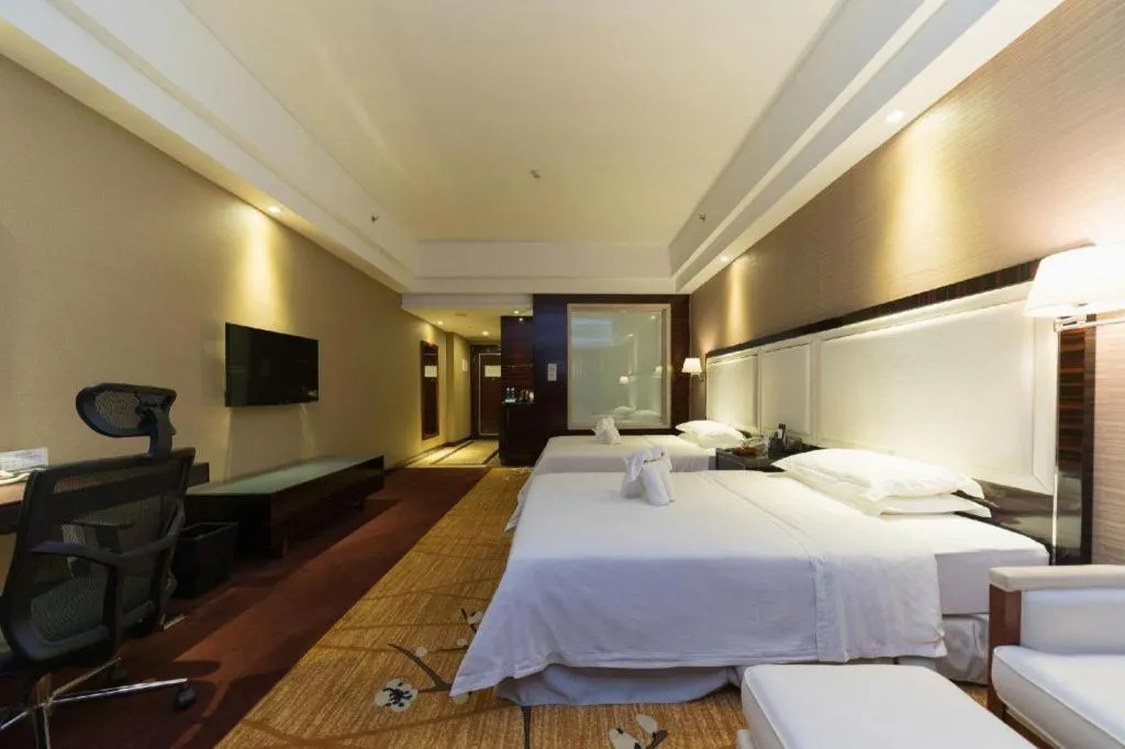 Bed in Country Garden Phoenix Hotel Yangshan