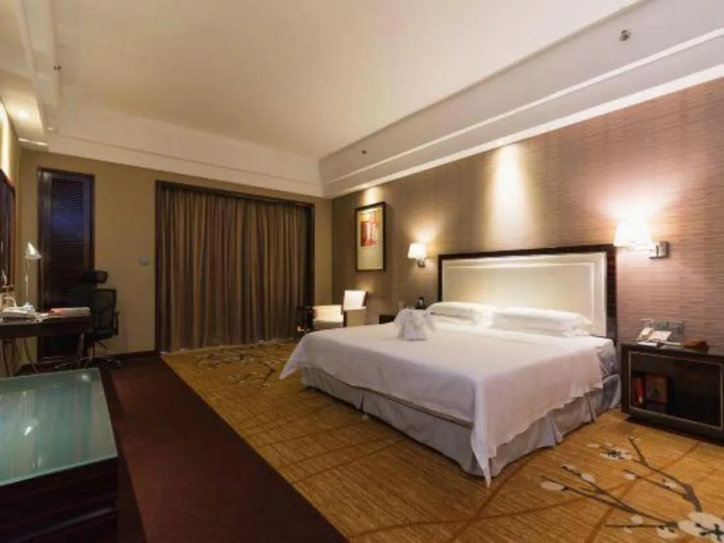Bed in Country Garden Phoenix Hotel Yangshan