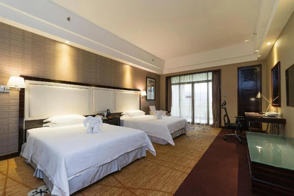 Bed in Country Garden Phoenix Hotel Yangshan