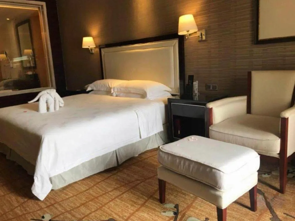Bed in Country Garden Phoenix Hotel Yangshan