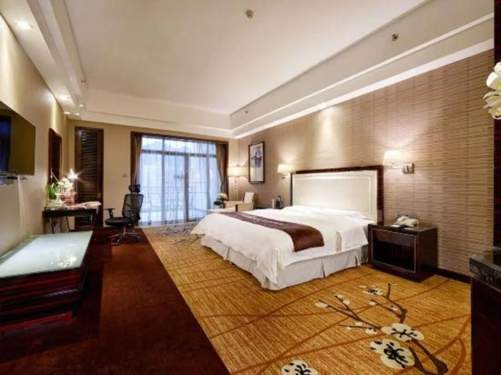 Bed in Country Garden Phoenix Hotel Yangshan